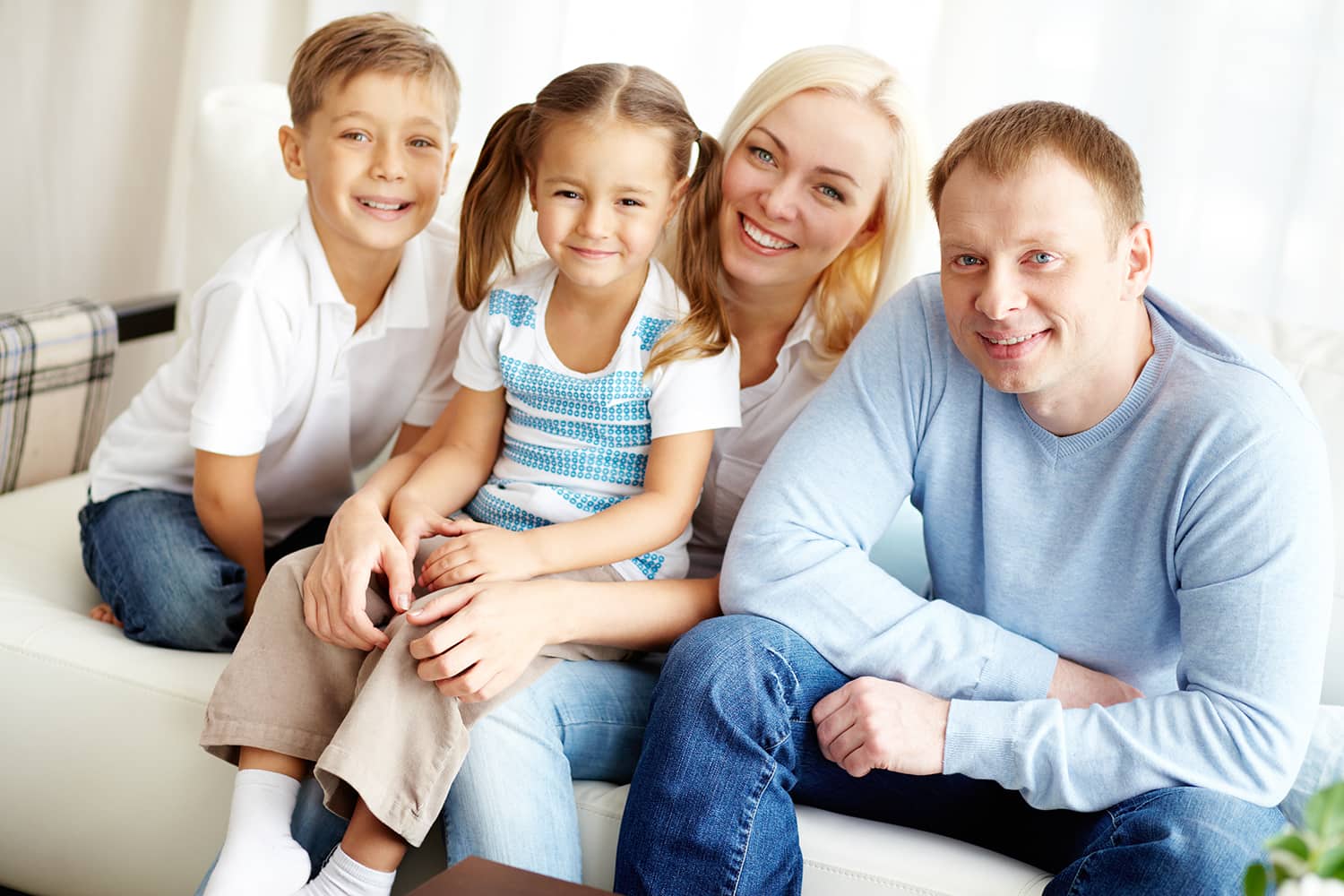 Happy Family with a great dentist. Couple with a boy and girl