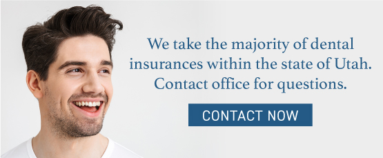 smiling man with text saying, "we take the majority of dental insurances within Utah. Call office for questions."